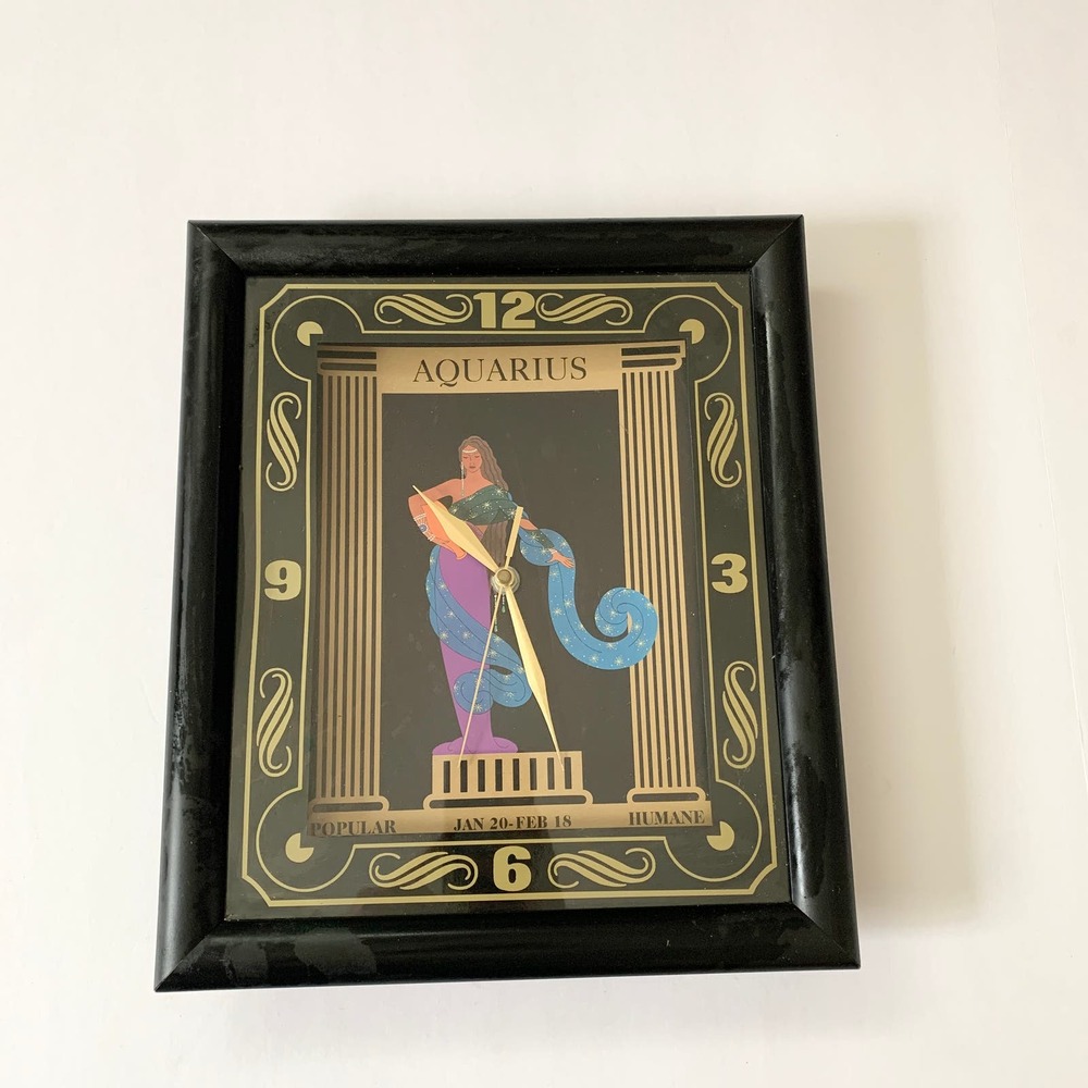 Vintage Aquarius Wall Clock Black and Gold with Multicolor Figure
